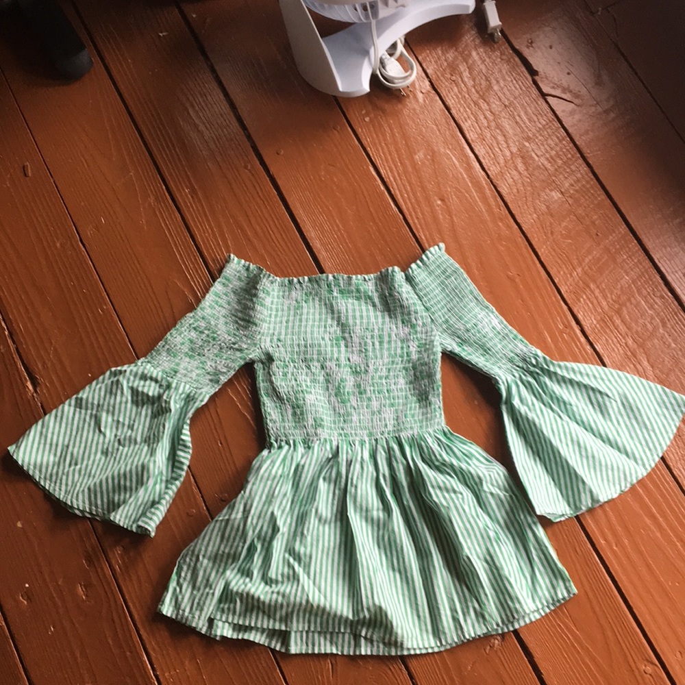 trendy striped top: brand is “CLINIC”